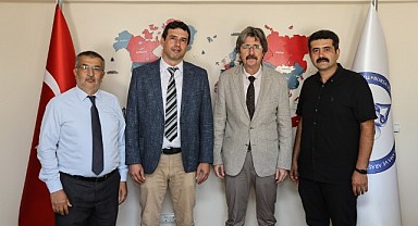 TÜDAM’da bayrak değişimi